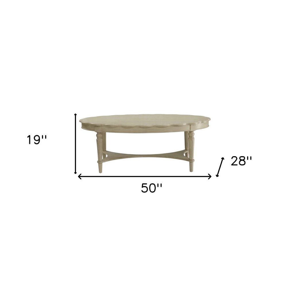50" Antiqued White Solid Wood Oval Distressed Coffee Table