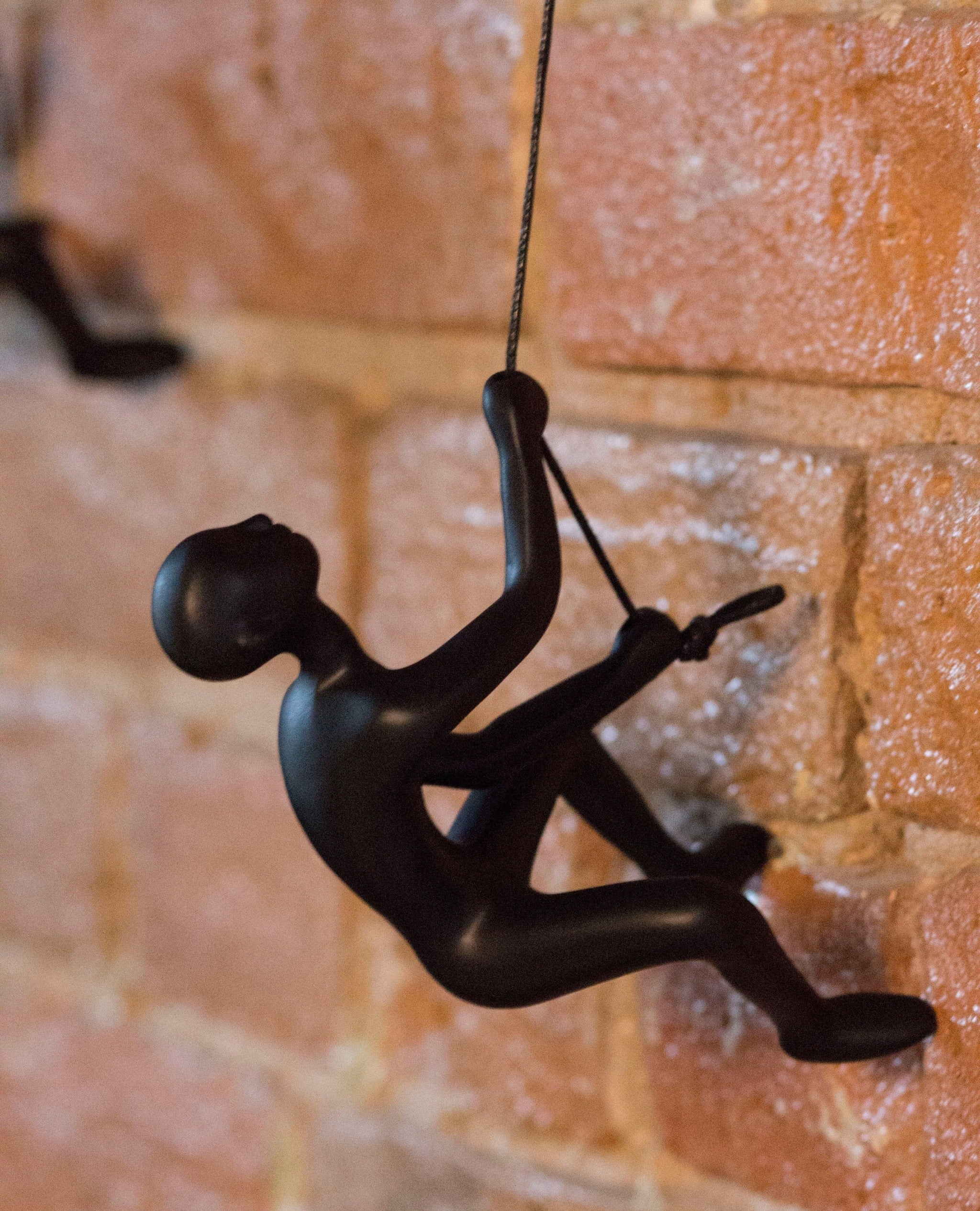 6" X 4" Black Resin Climbing Man Hanging Dimensional Sculpture