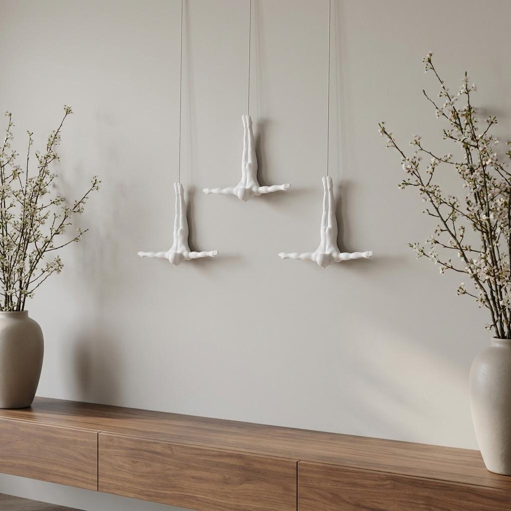 Set of Three White Resin Diving Man Hanging Dimensional Sculpture
