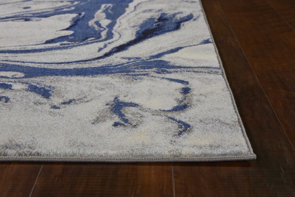 7' X 10' Blue Gray And Ivory Abstract Area Rug