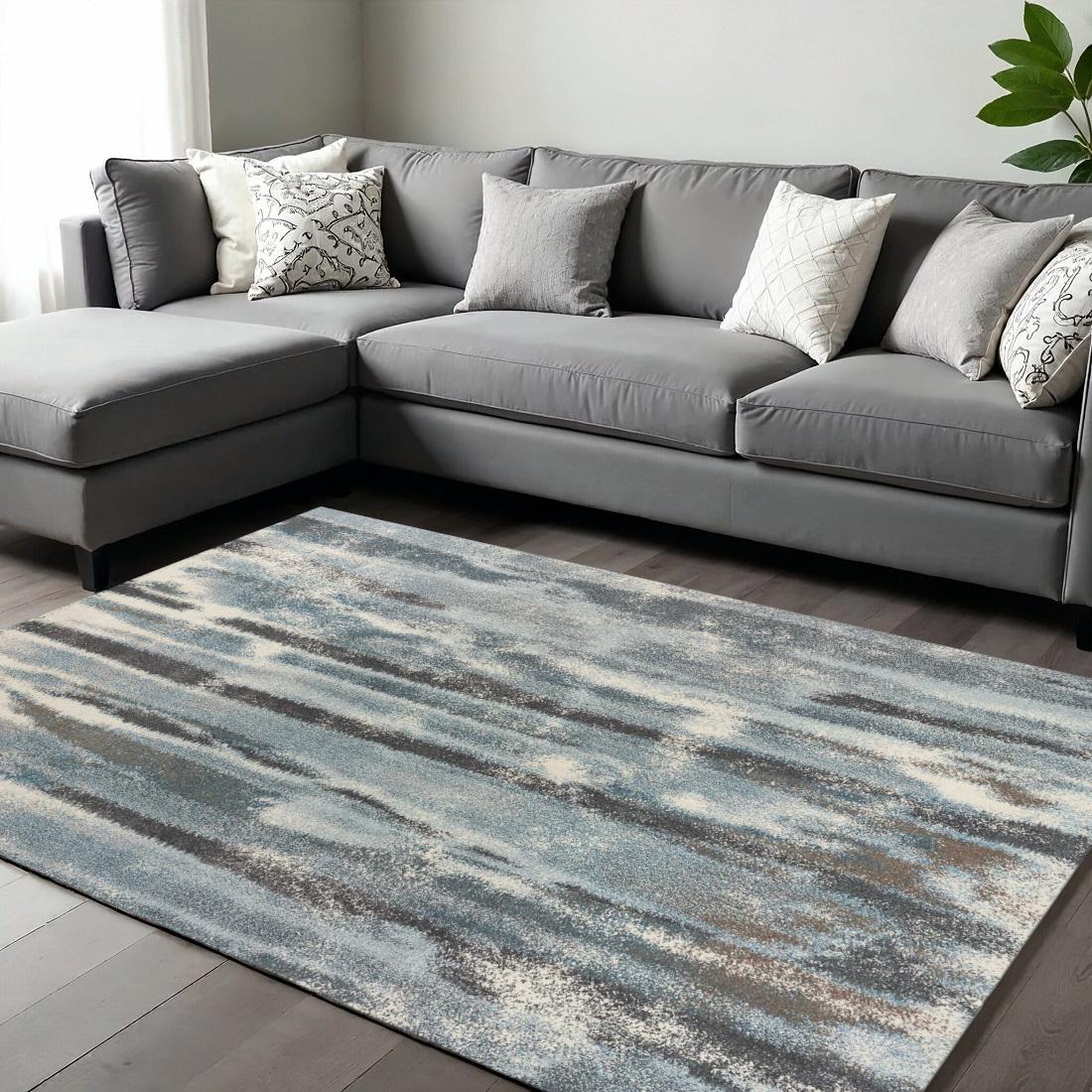 7' X 10' Teal Blue And White Abstract Distressed Area Rug