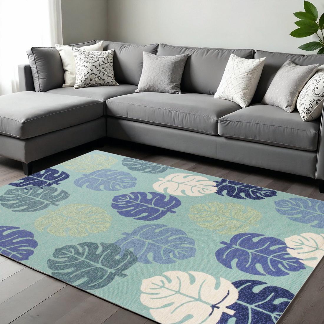 7' X 9' Turquoise And Ivory Botanical Leaves Hand Tufted Area Rug