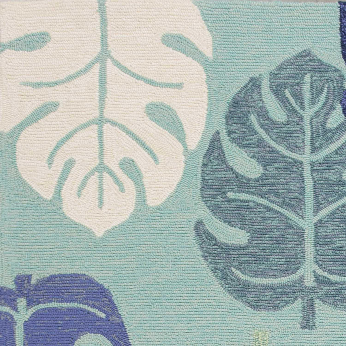 7' X 9' Turquoise And Ivory Botanical Leaves Hand Tufted Area Rug
