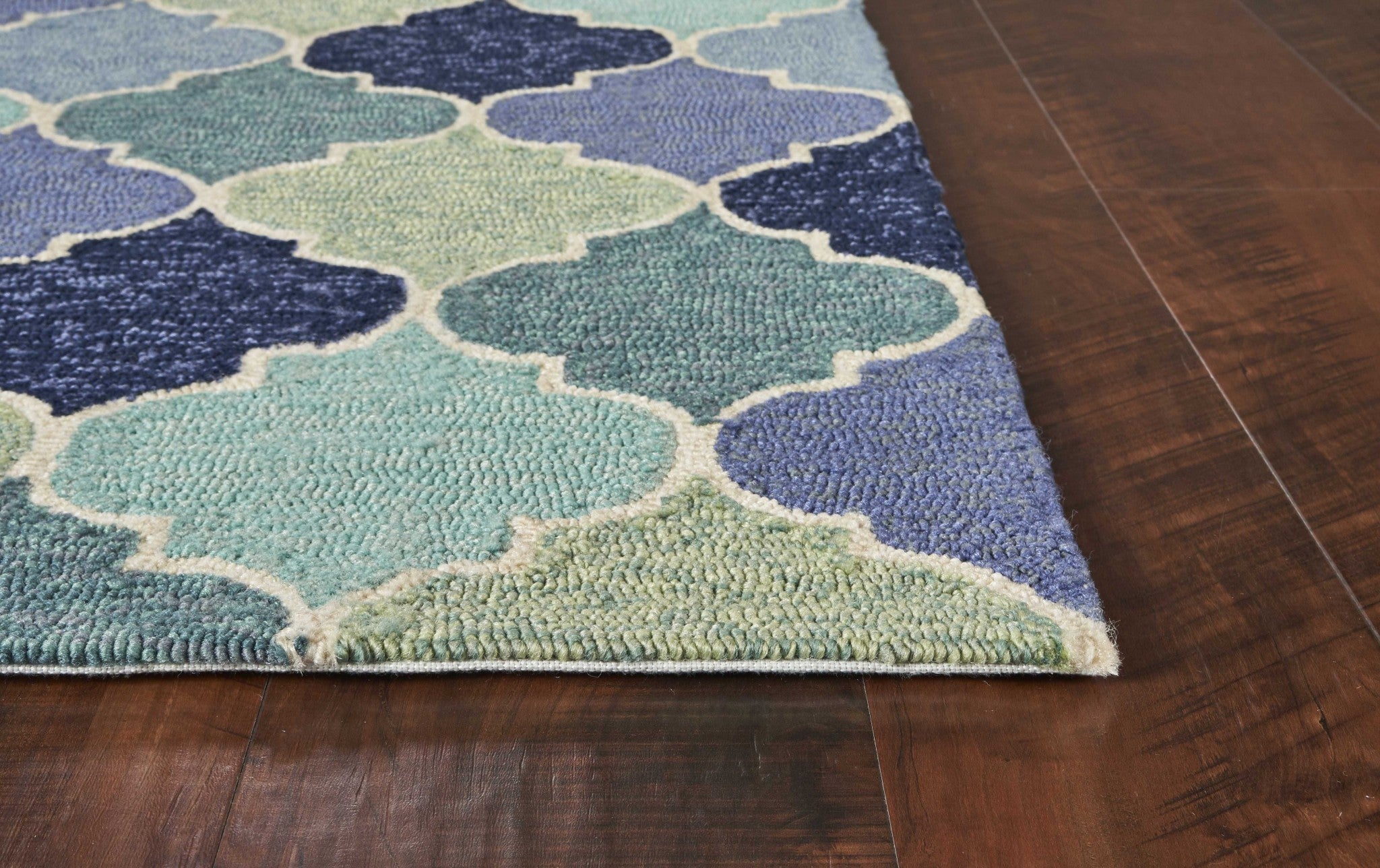 7' X 9' Blue Purple And Aqua Quatrefoil Hand Tufted Area Rug