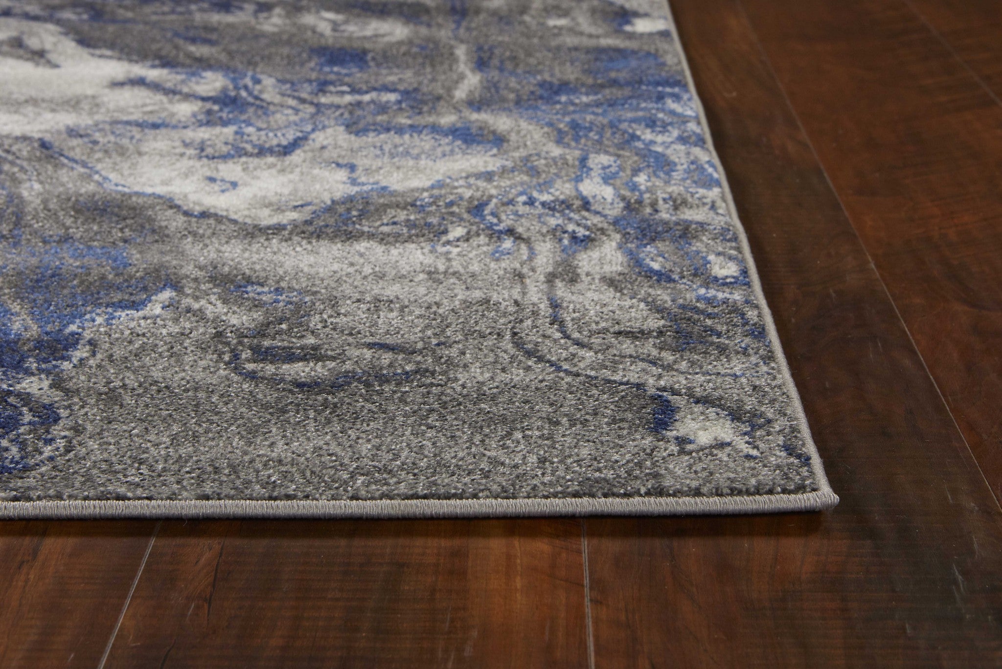 5' X 8' Blue And Gray Abstract Area Rug