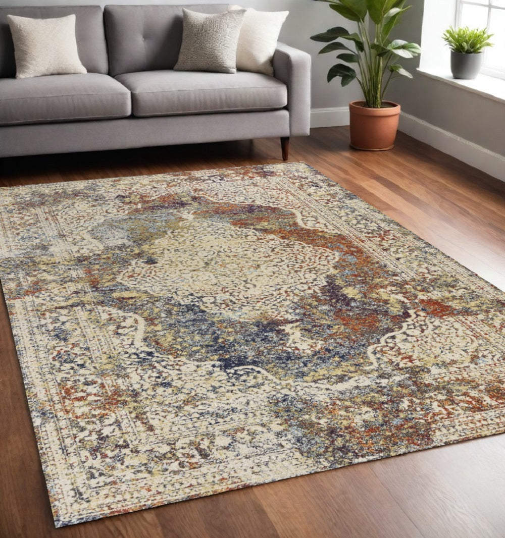5' X 8' Ivory Blue And Orange Medallion Area Rug