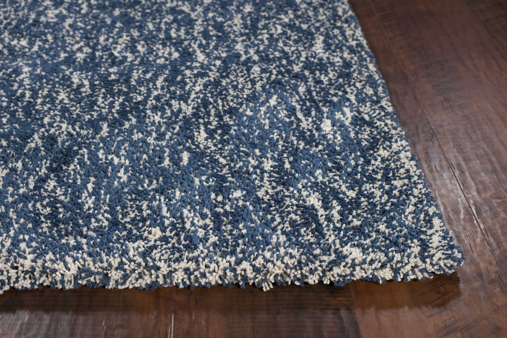 5' X 7' Indigo And Ivory Abstract Hand Woven Area Rug