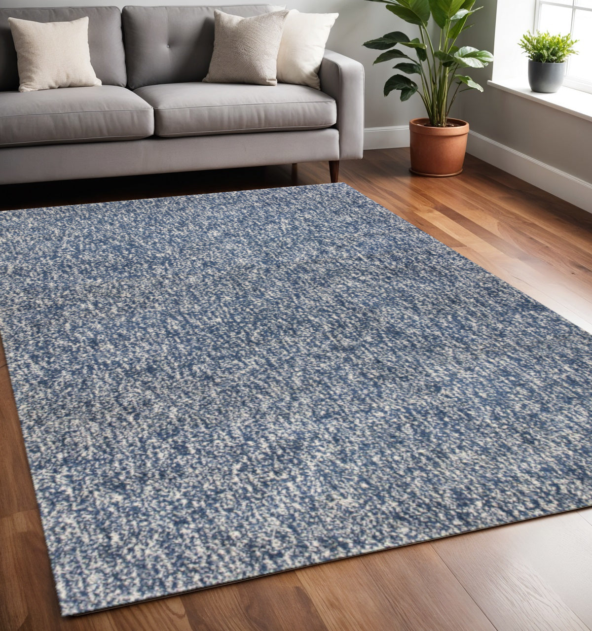 5' X 7' Indigo And Ivory Abstract Hand Woven Area Rug