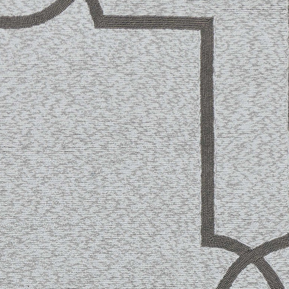 5' X 7' Ivory And Brown Geometric Handmade Indoor Outdoor Area Rug
