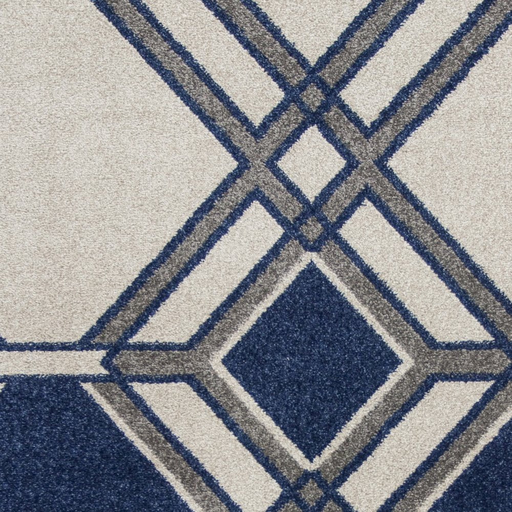 8' X 11' Blue Ivory And Gray Geometric Area Rug