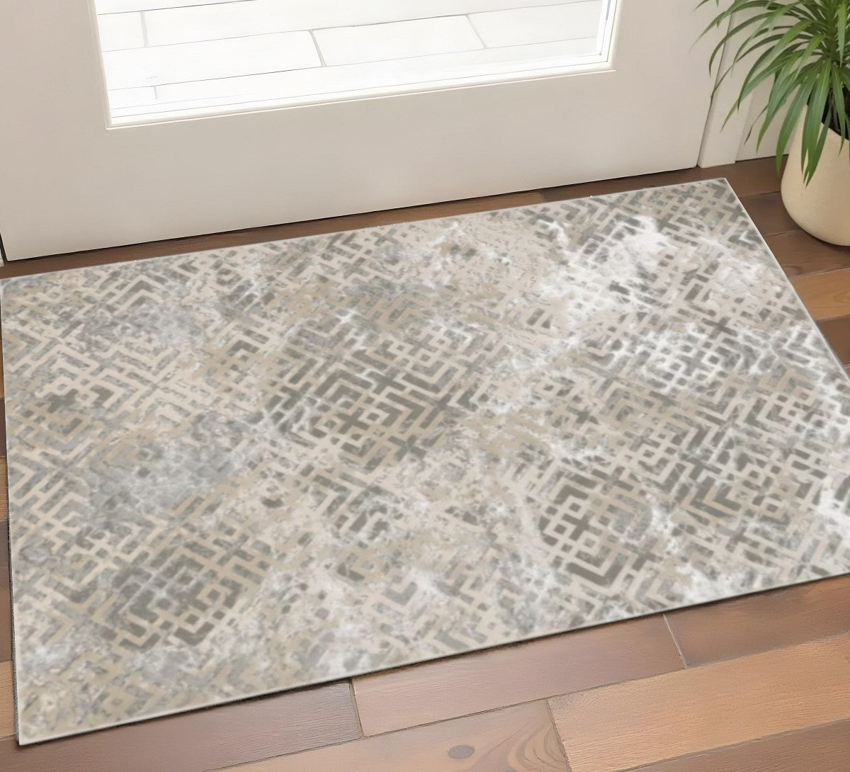 3' X 5' Sand And Light Blue Geometric Distressed Area Rug