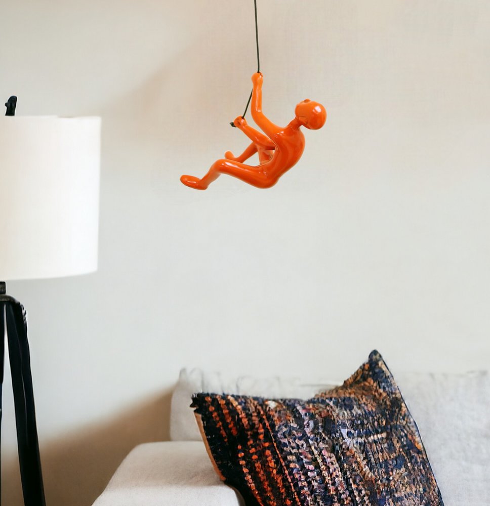 6" X 3" Orange Resin Climbing Man Hanging Dimensional Sculpture