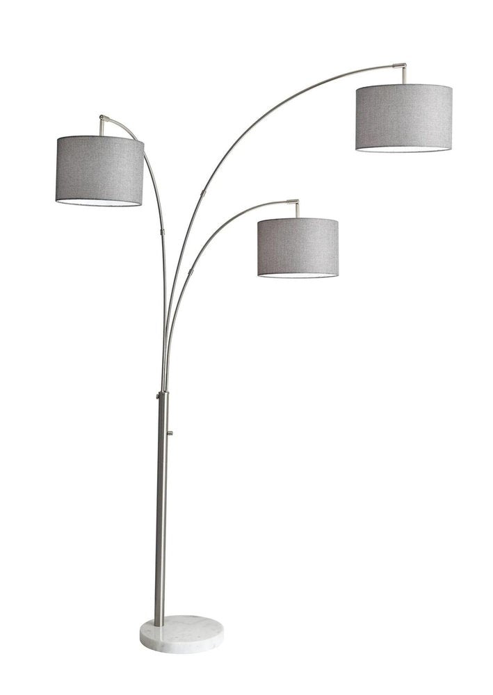 74" Brass Three Light Arc Floor Lamp With Off White Fabric Drum Shade