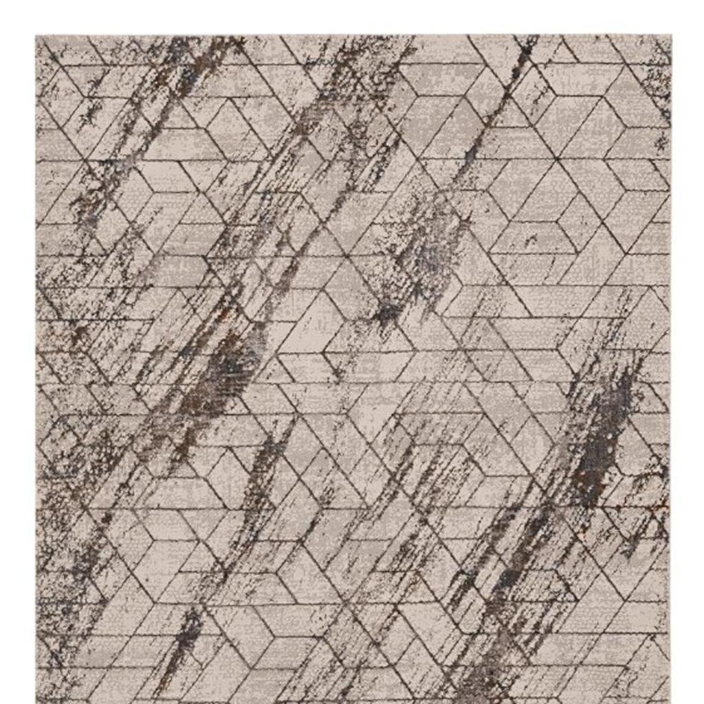 7' X 10' Ivory And Brown Geometric Area Rug