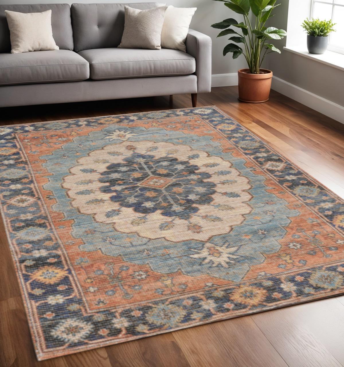 5' X 7' Blue Orange And Black Jute Medallion Hand Woven Area Rug