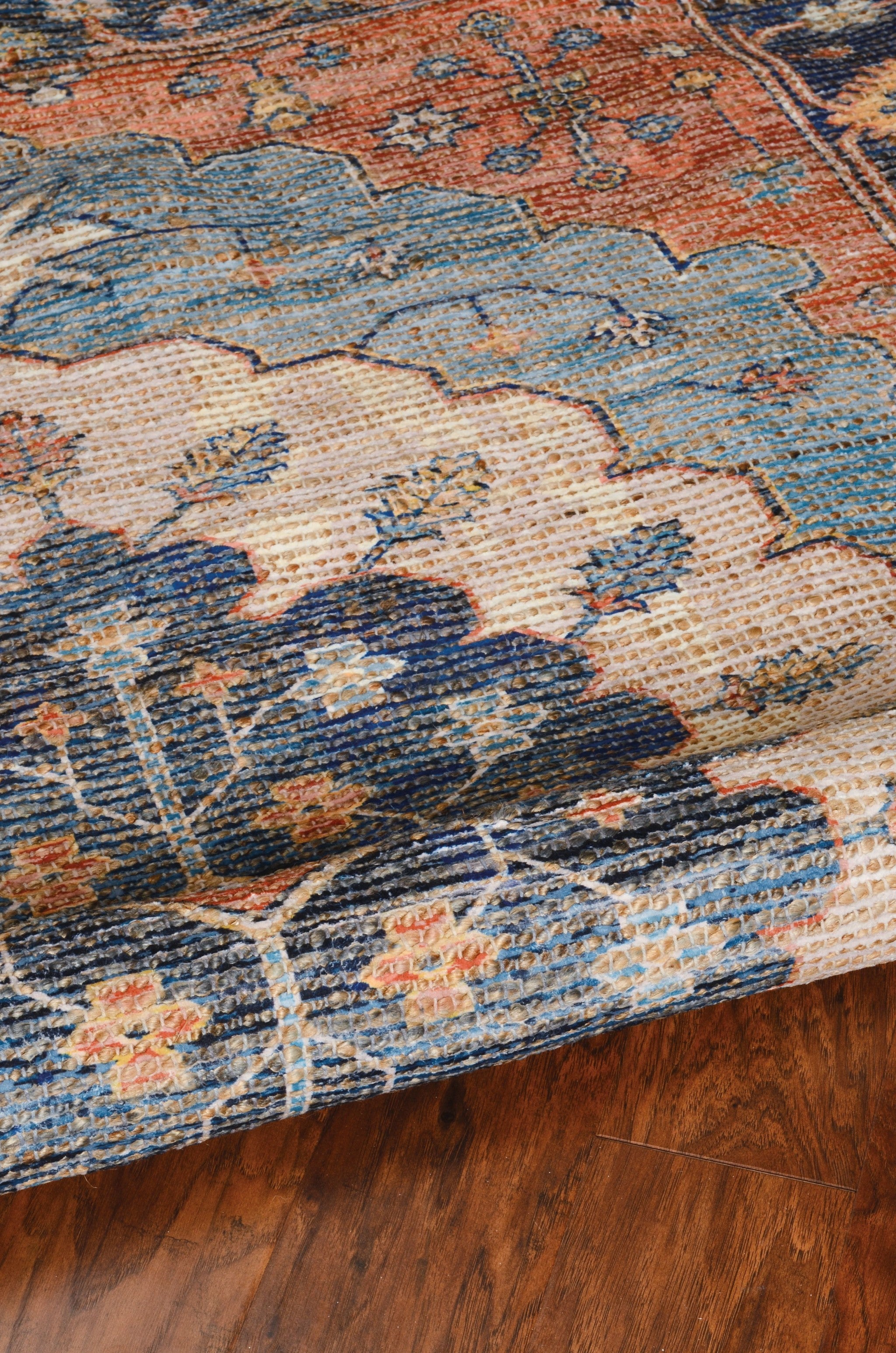 5' X 7' Blue Orange And Black Jute Medallion Hand Woven Area Rug