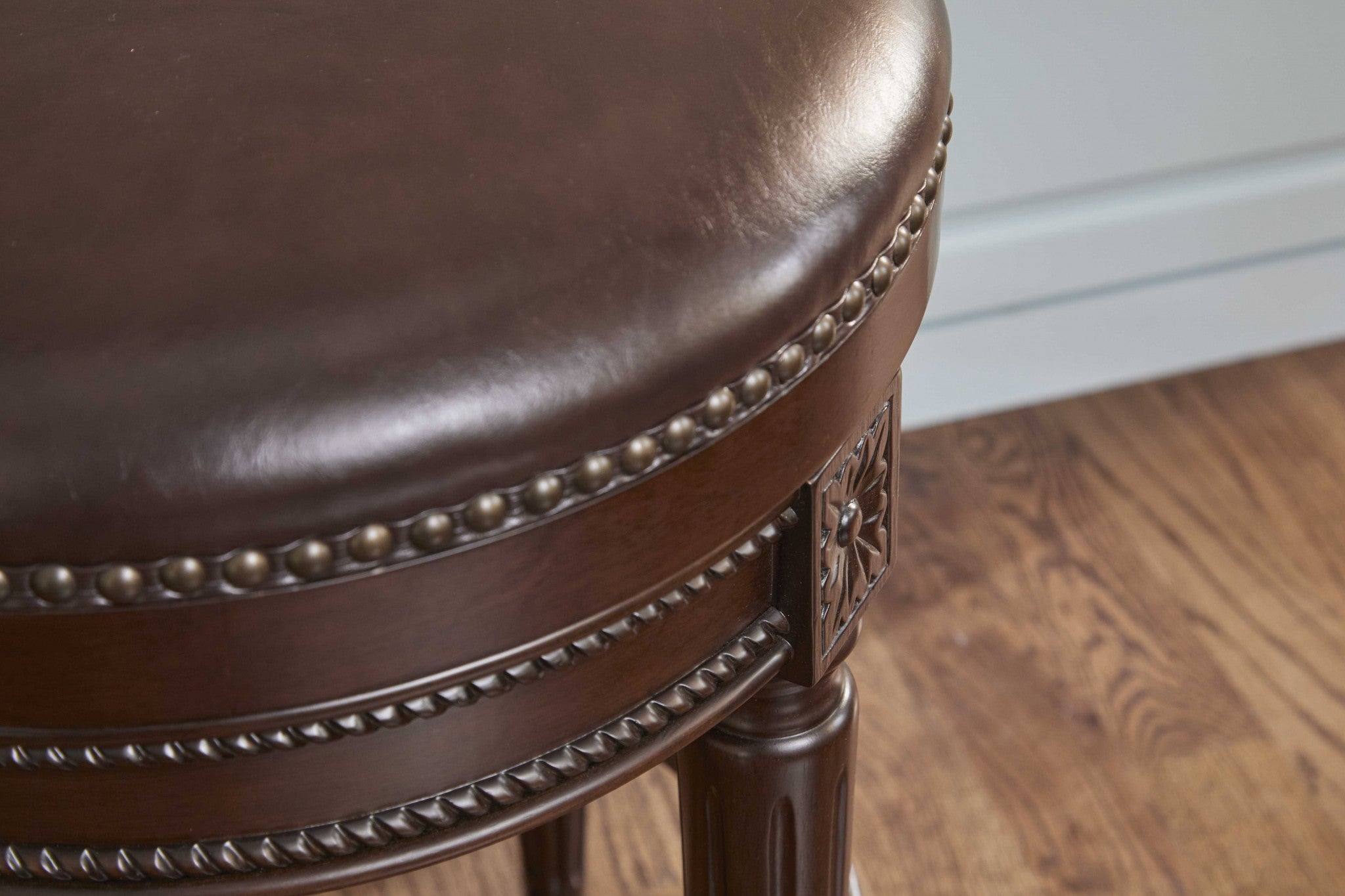 26" Dark Brown And Brown Faux Leather And Wood Backless Counter Height Swivel Bar Chair