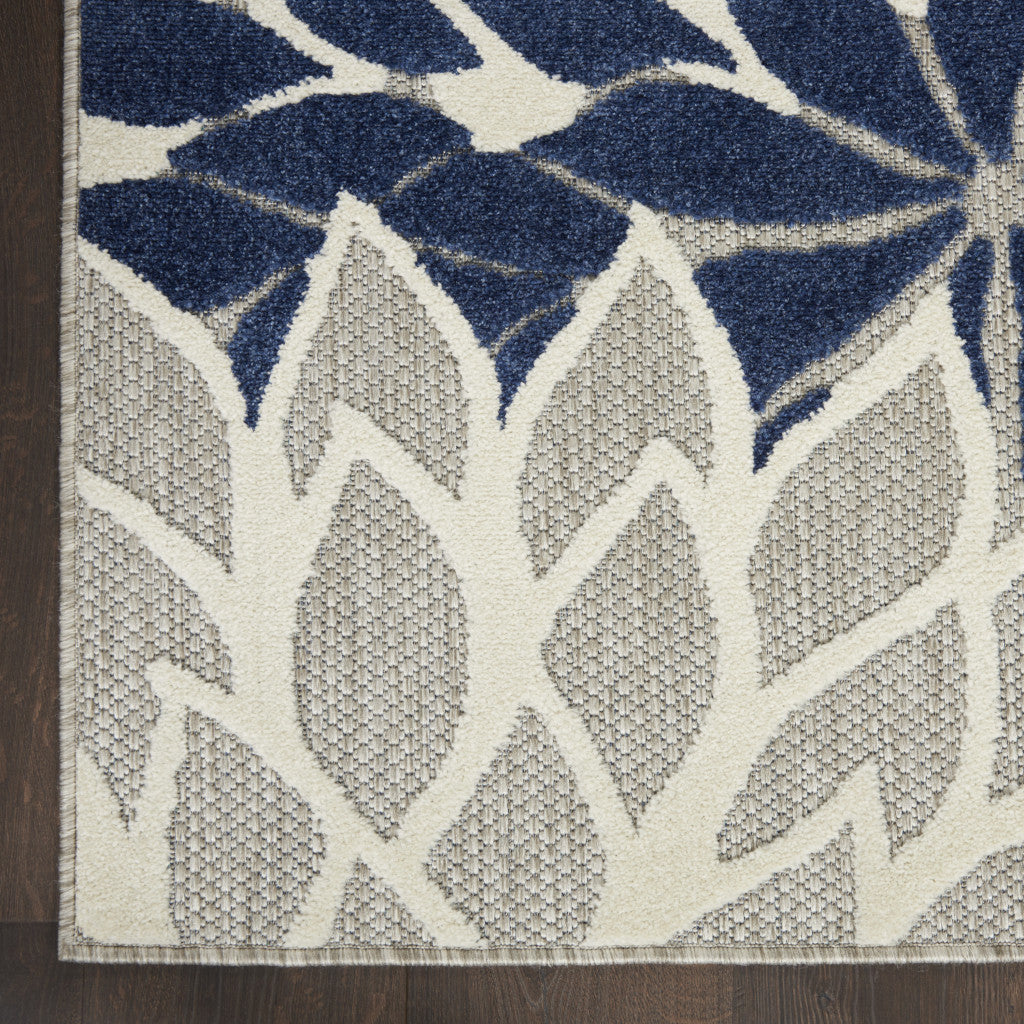 7' X 10' Ivory And Blue Indoor Outdoor Area Rug