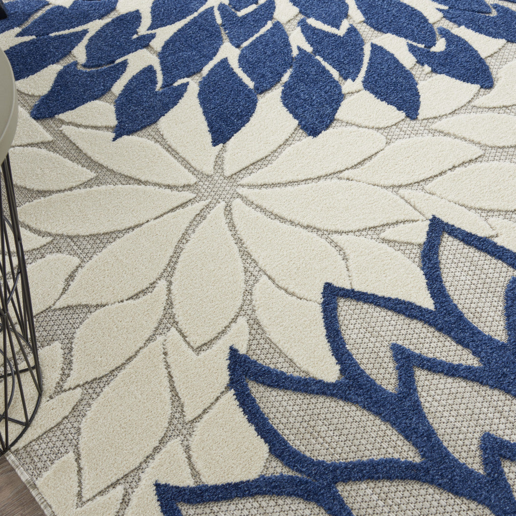 7' X 10' Ivory And Blue Indoor Outdoor Area Rug