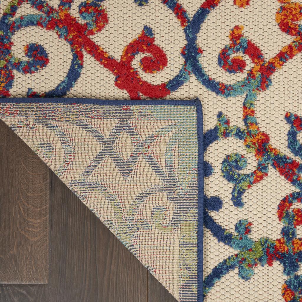 5' X 8' Ivory And Blue Indoor Outdoor Area Rug