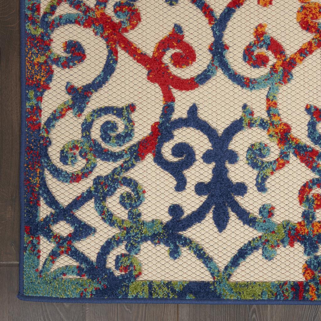 5' X 8' Ivory And Blue Indoor Outdoor Area Rug