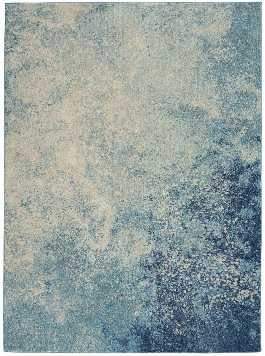5' X 7' Blue And Ivory Abstract Area Rug