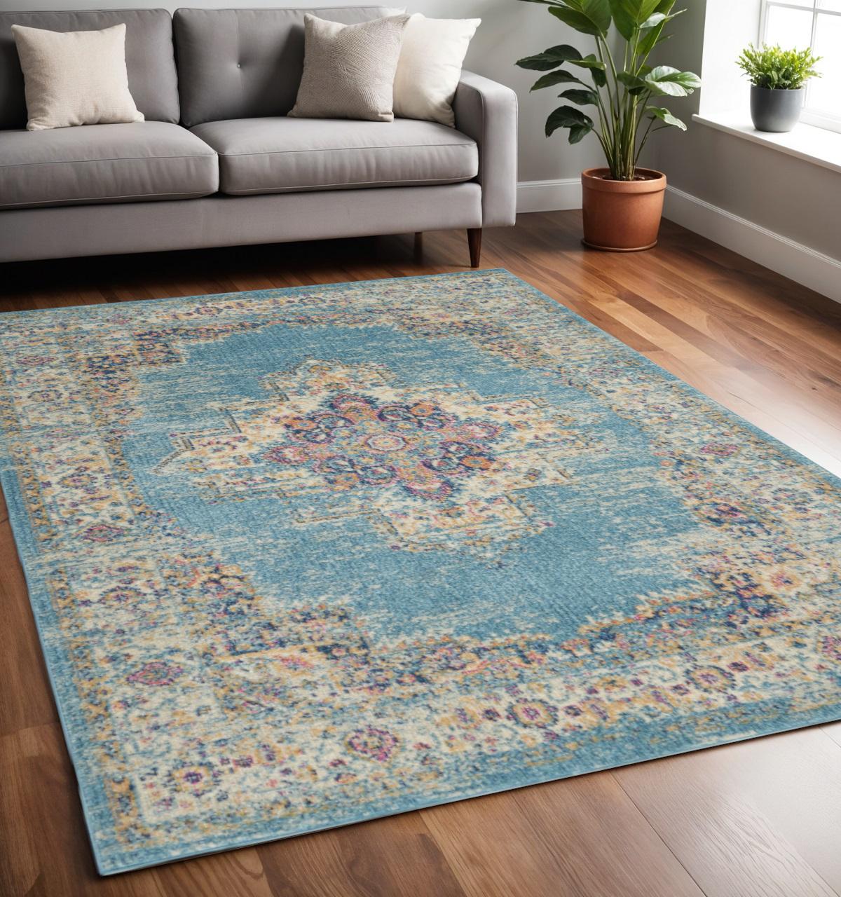 5' X 7' Blue And Ivory Southwestern Distressed Area Rug
