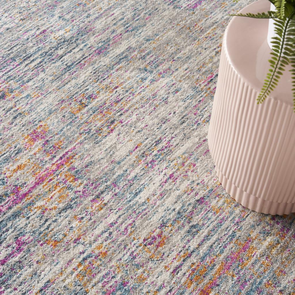 5' X 7' Ivory And Blue Abstract Area Rug