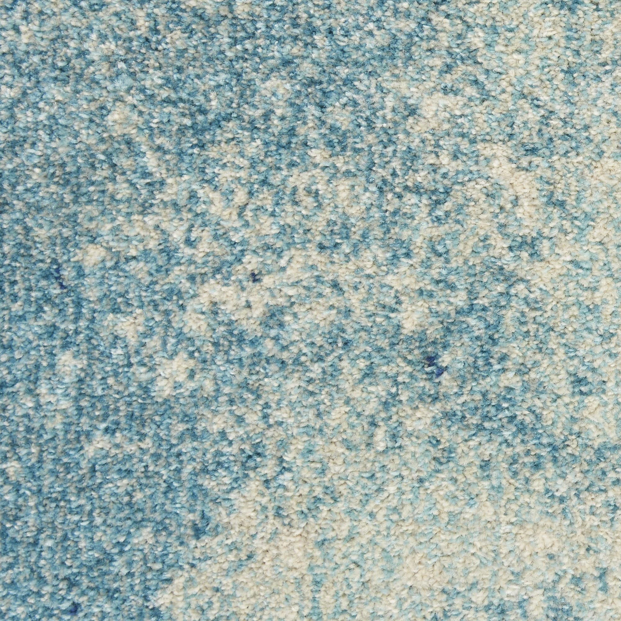 7' X 10' Blue And Ivory Abstract Area Rug