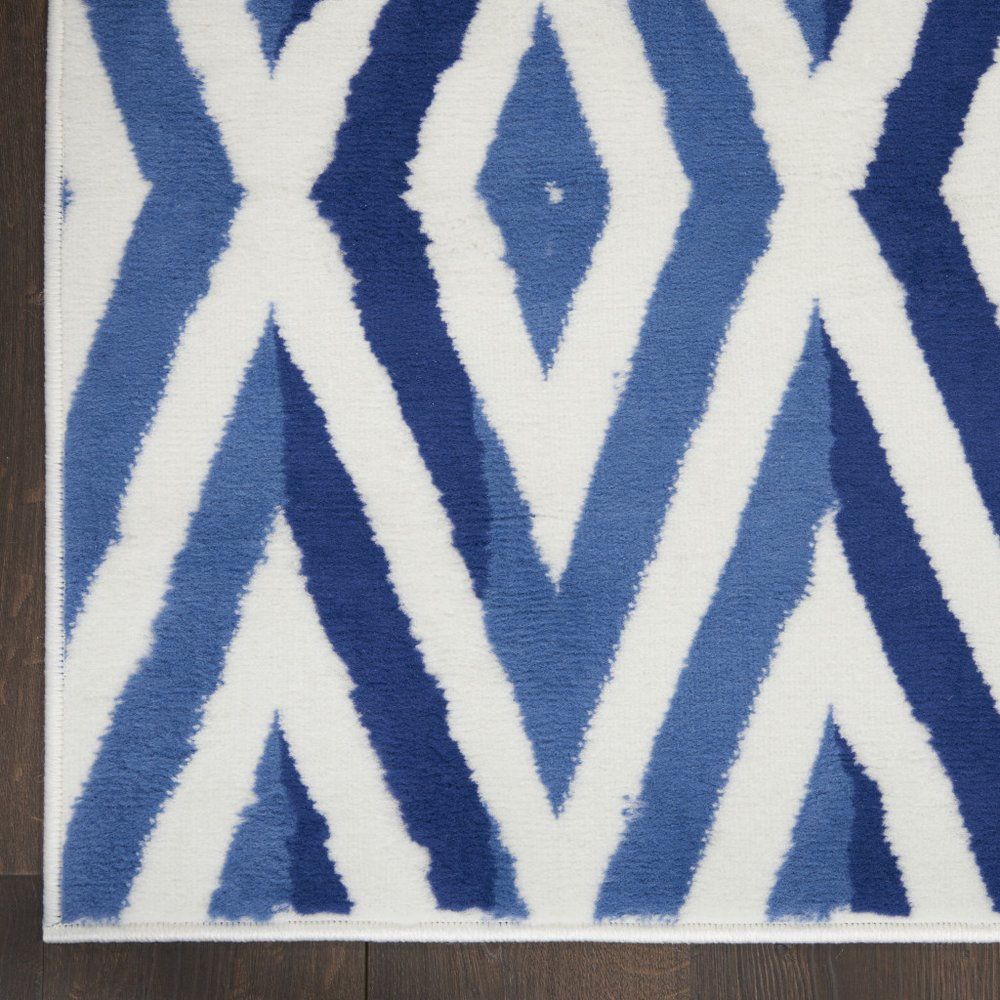 4' X 6' Ivory And Blue Geometric Area Rug