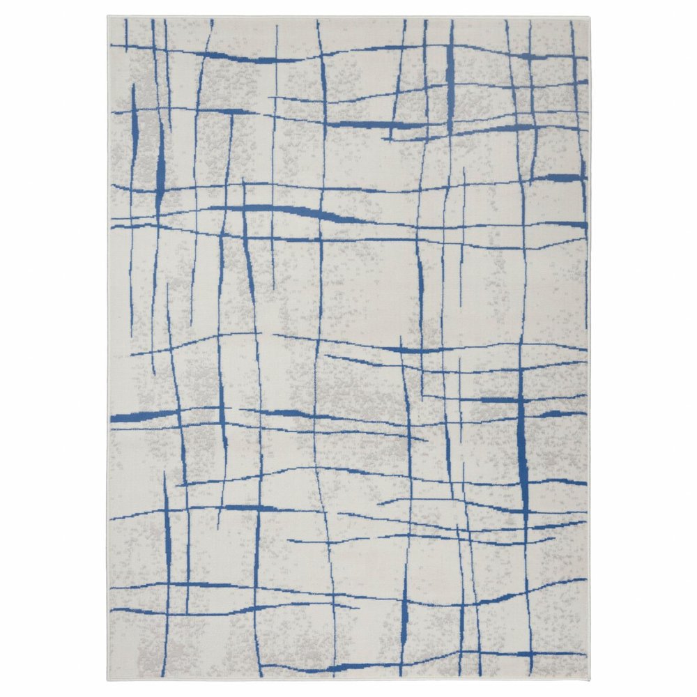 4' X 6' Ivory And Blue Geometric Distressed Area Rug
