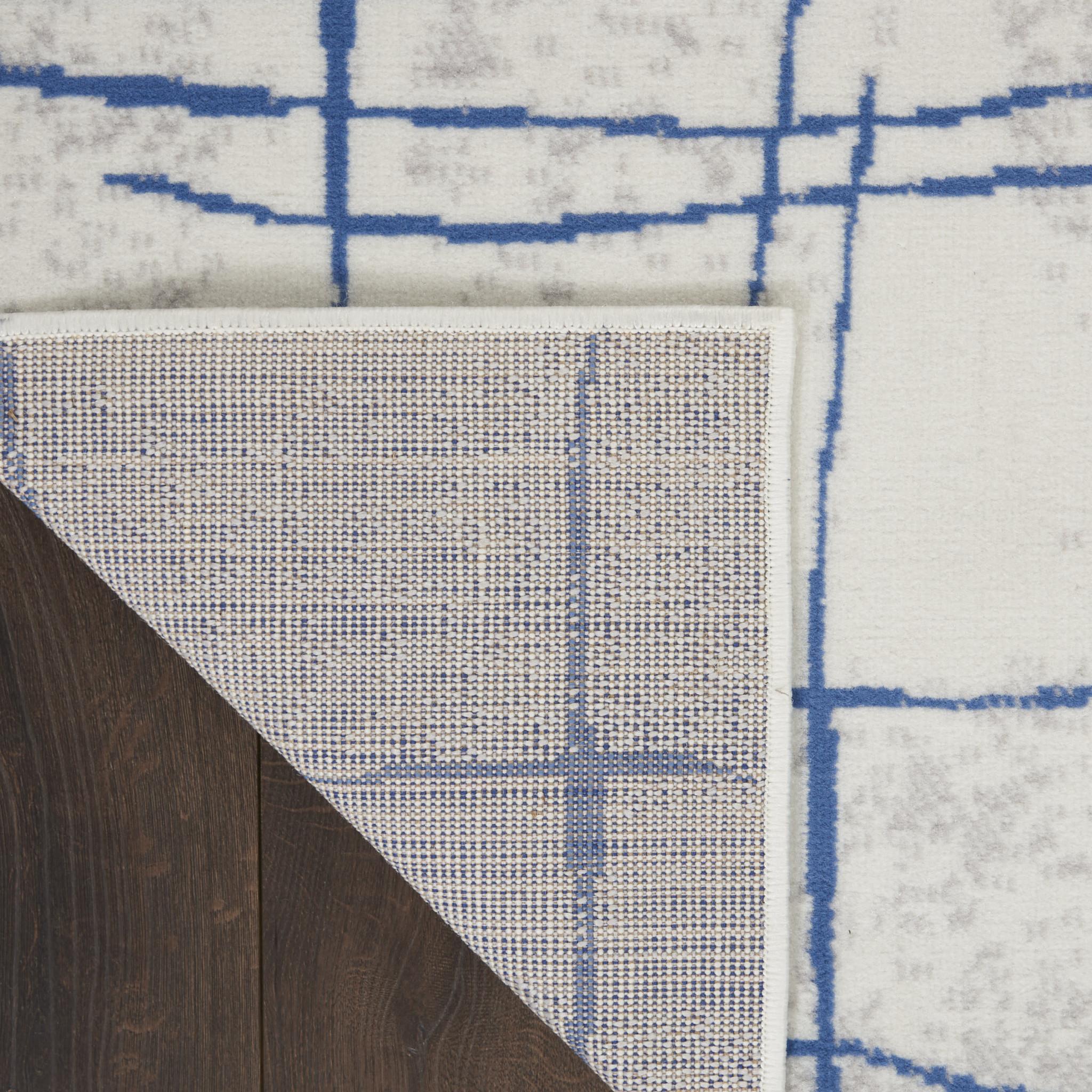 4' X 6' Ivory And Blue Geometric Distressed Area Rug