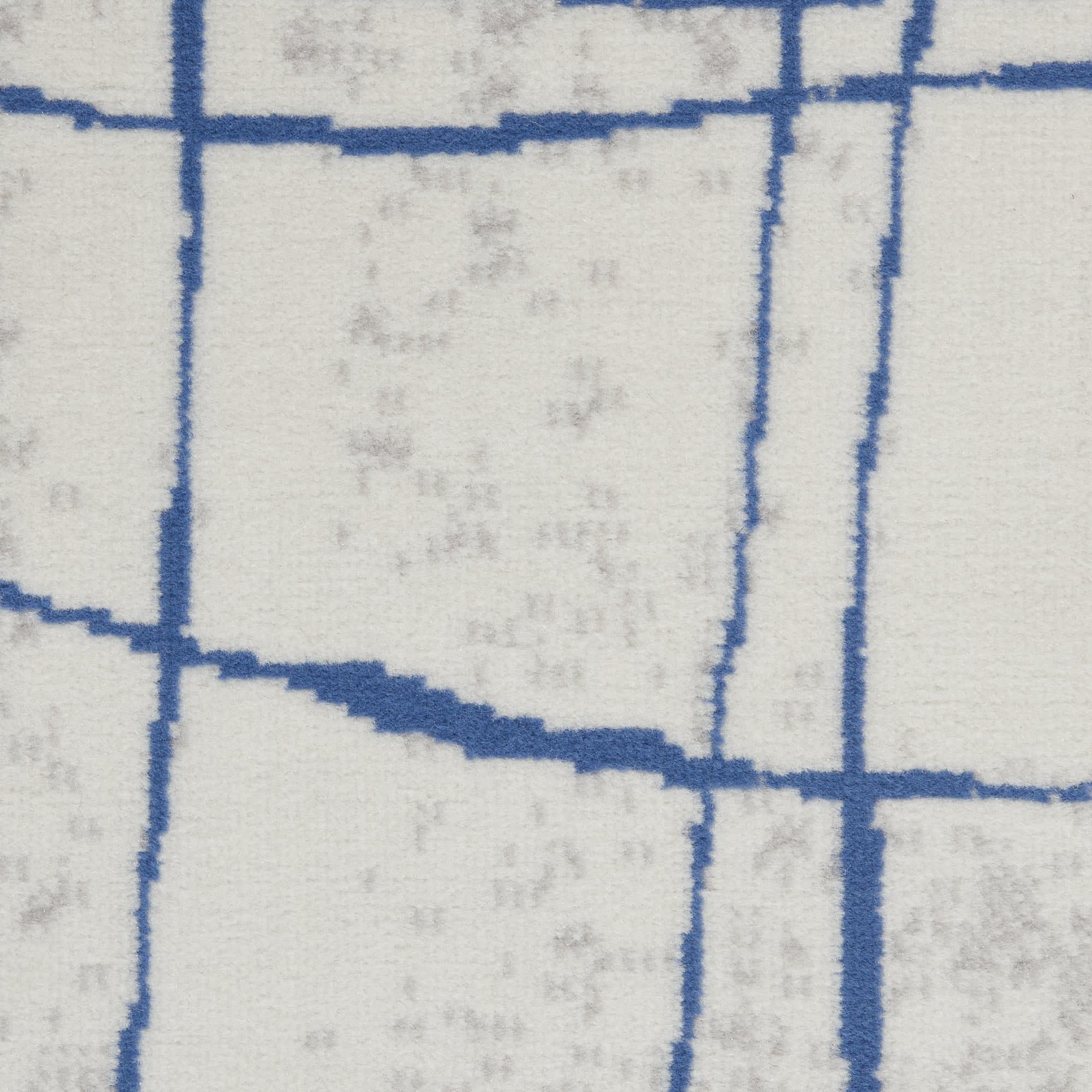 4' X 6' Ivory And Blue Geometric Distressed Area Rug