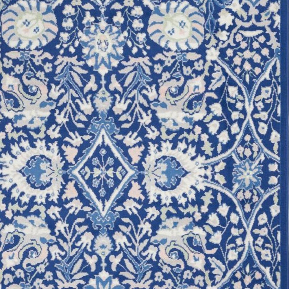 4' X 6' Ivory And Blue Floral Area Rug