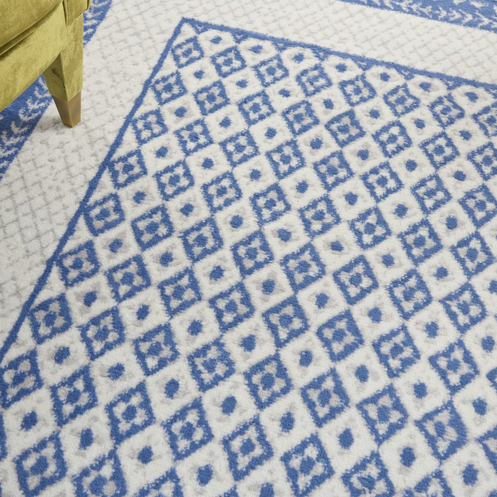 4' X 6' Ivory And Blue Geometric Area Rug