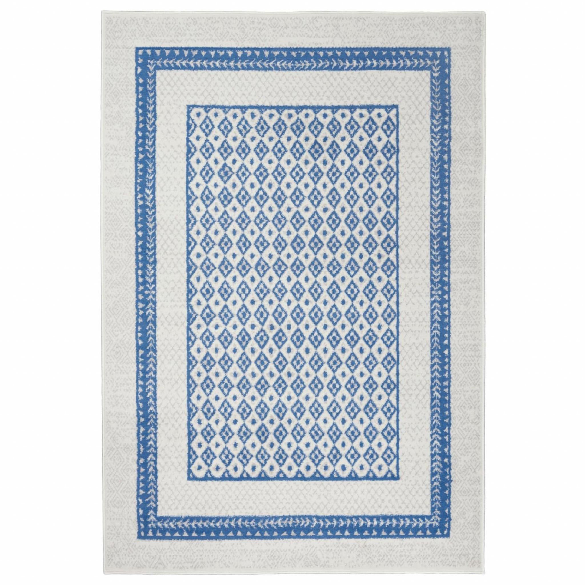 4' X 6' Ivory And Blue Geometric Area Rug