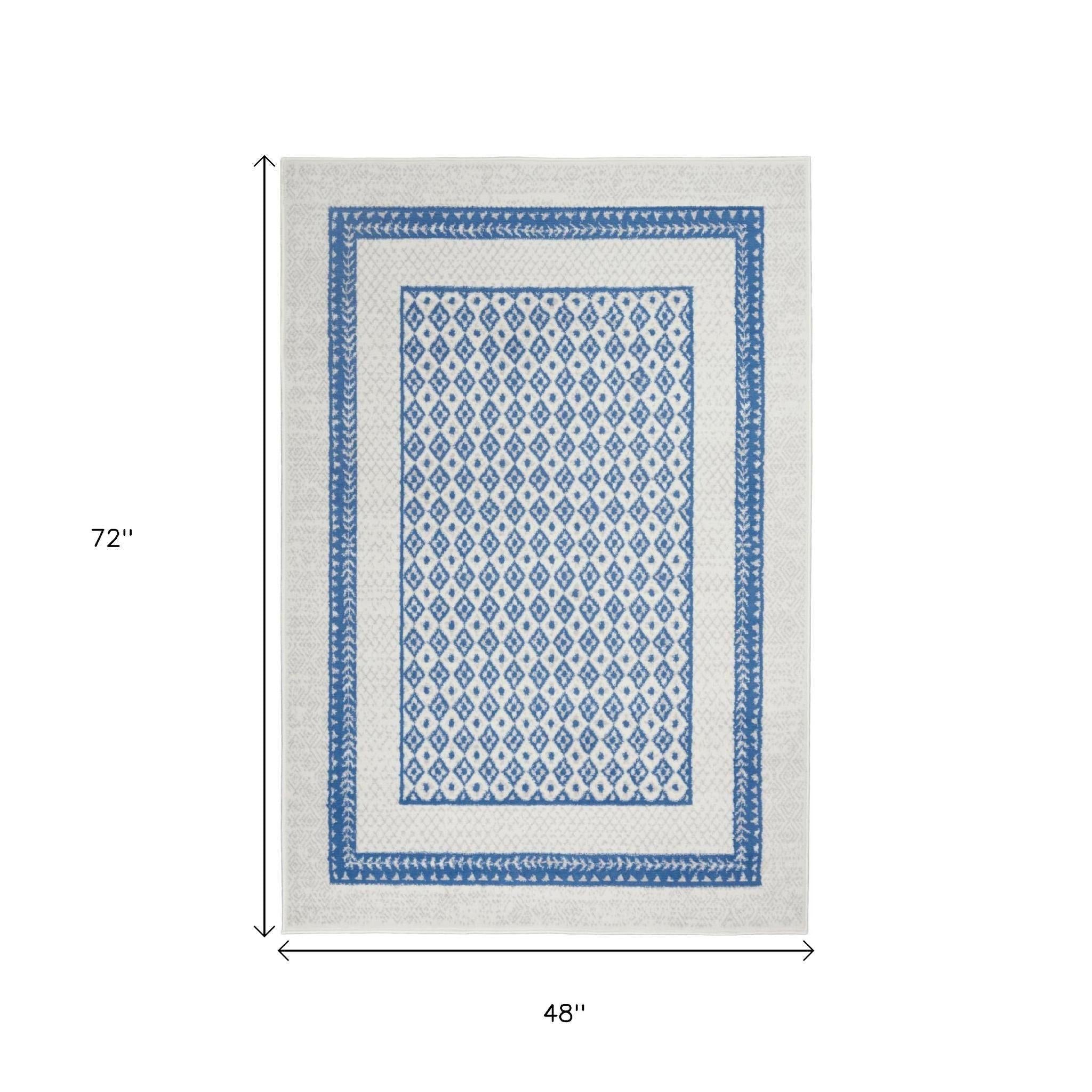 4' X 6' Ivory And Blue Geometric Area Rug