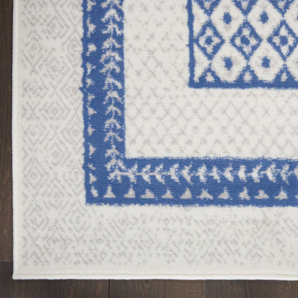 4' X 6' Ivory And Blue Geometric Area Rug