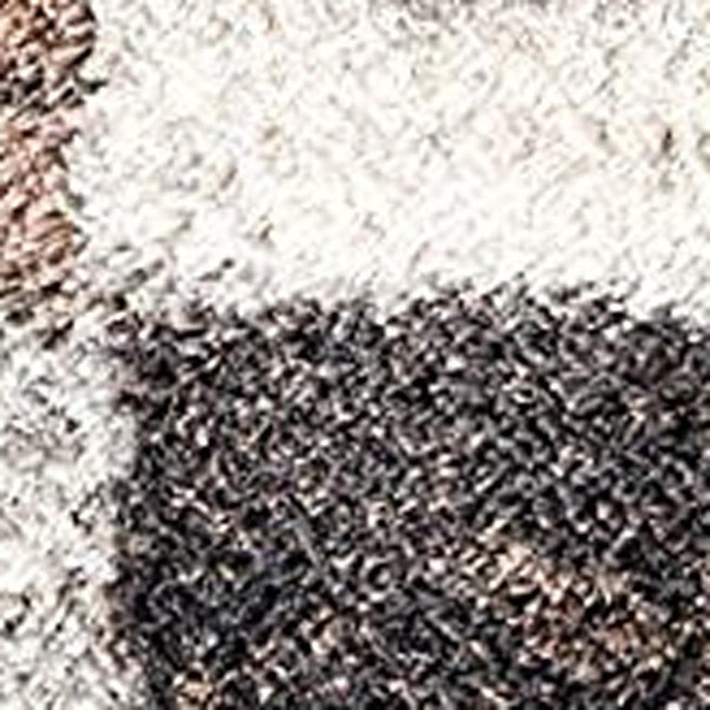 8' X 11' Beige and Ivory Patchwork Shag Area Rug