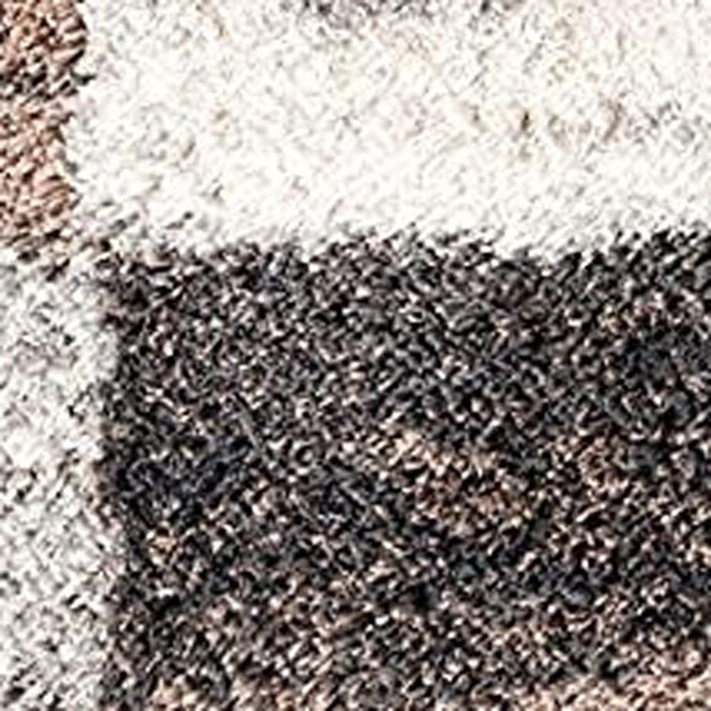 8' X 11' Beige and Ivory Patchwork Shag Area Rug