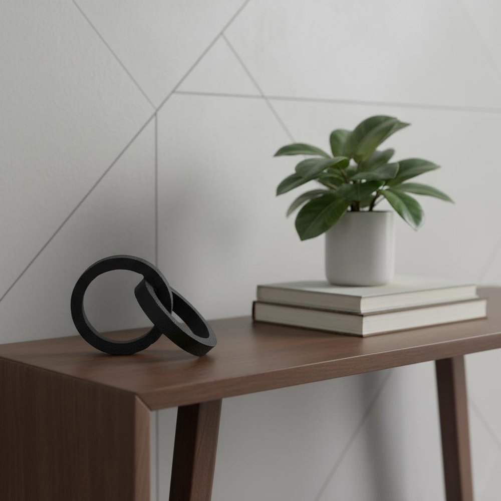 Two Ring Black Hammered Metal Sculpture