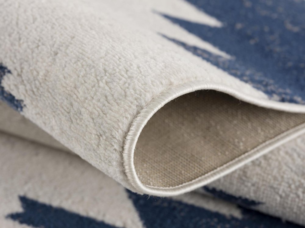 9' X 13' Blue And Ivory Southwestern Shag Area Rug