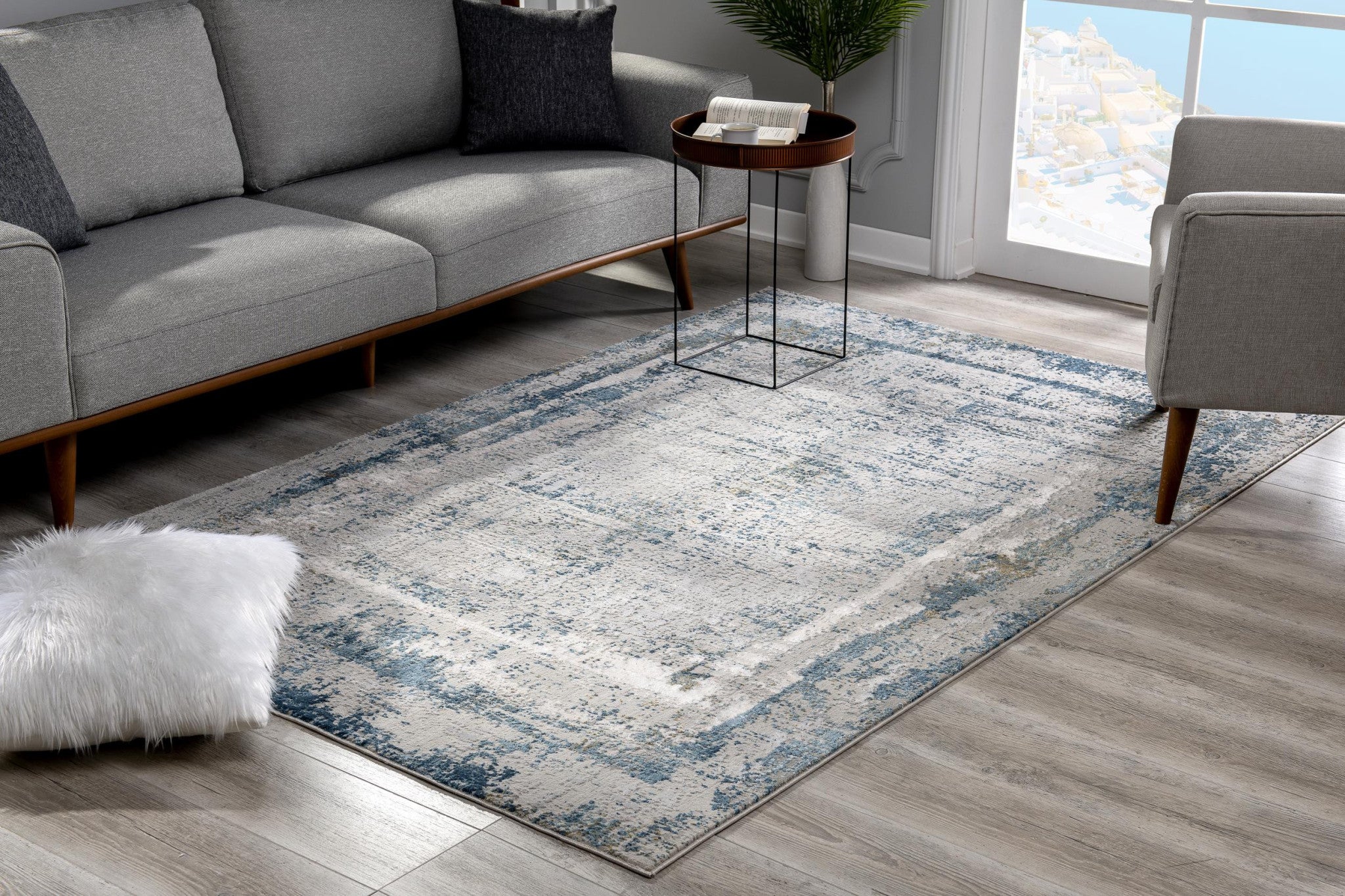 4' X 6' Blue and Ivory Abstract Power Loom Area Rug