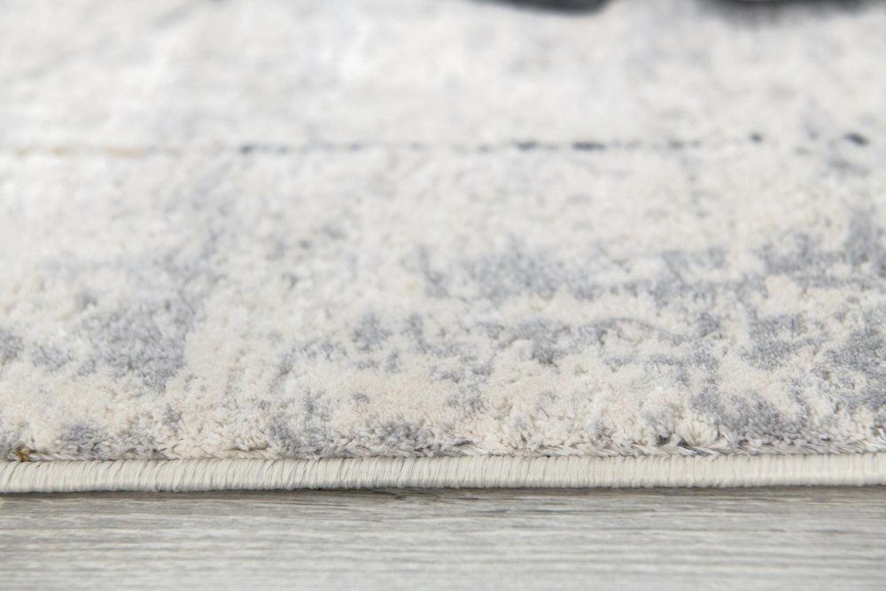 4' X 6' Gray and Ivory Abstract Power Loom Area Rug