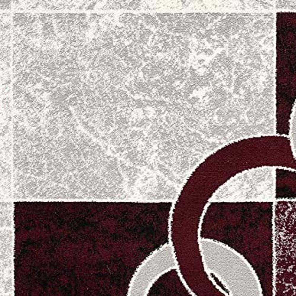 10' Red And White Abstract Runner Rug
