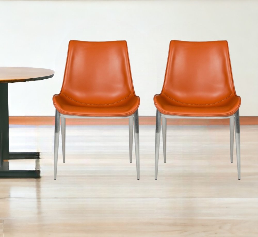 Set of Two Terra Cotta and Silver Upholstered Faux Leather Wing Back Dining Side Chairs