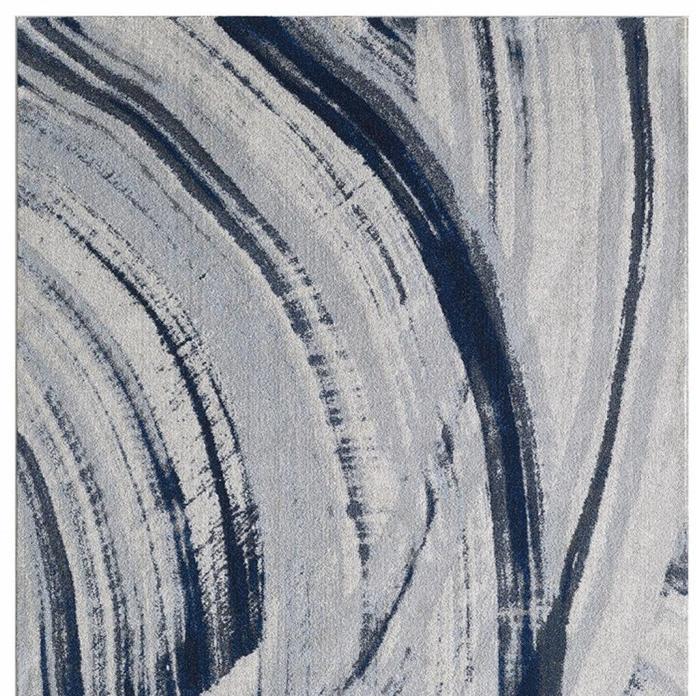 5' X 8' Ivory and Blue Abstract Area Rug