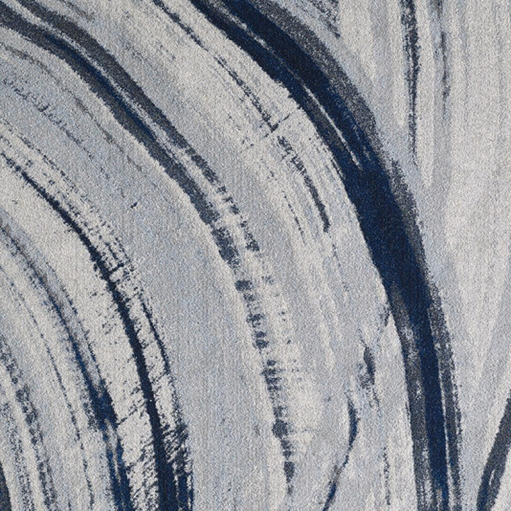 7' X 10' Ivory and Blue Abstract Area Rug
