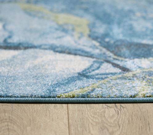 8' X 11' Teal Blue Green And Ivory Abstract Area Rug