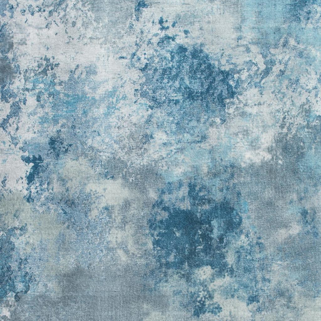 6' X 9' Blue And Ivory Abstract Area Rug